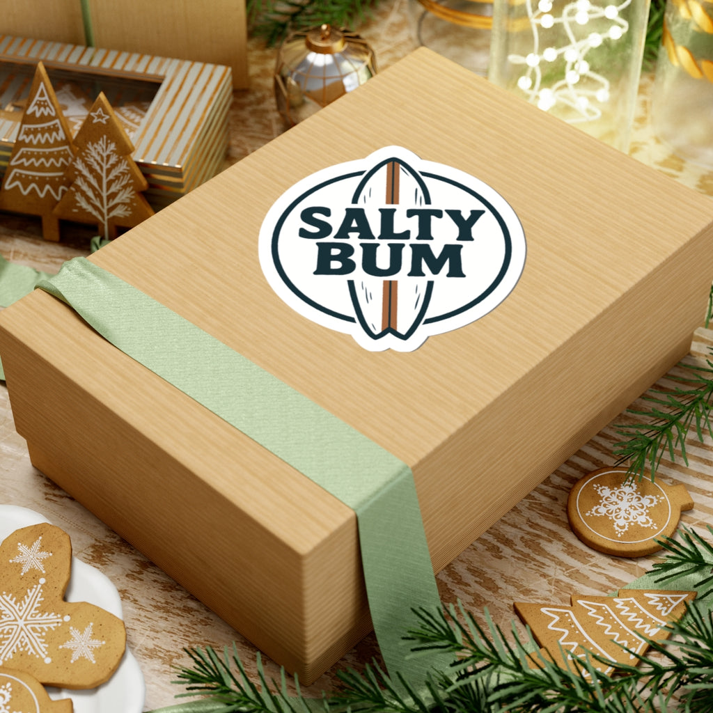 Wooden gift box with 'Salty Bum' logo, surrounded by Christmas decorations on a wooden table.