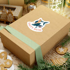 Wooden gift box with a 'Salty Bum' logo on a festive background with cookies and greenery.