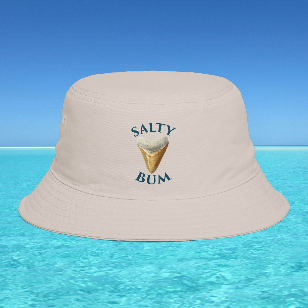 Beige bucket hat with 'Salty Bum' text and ice cream graphic on a blue water and sky background
