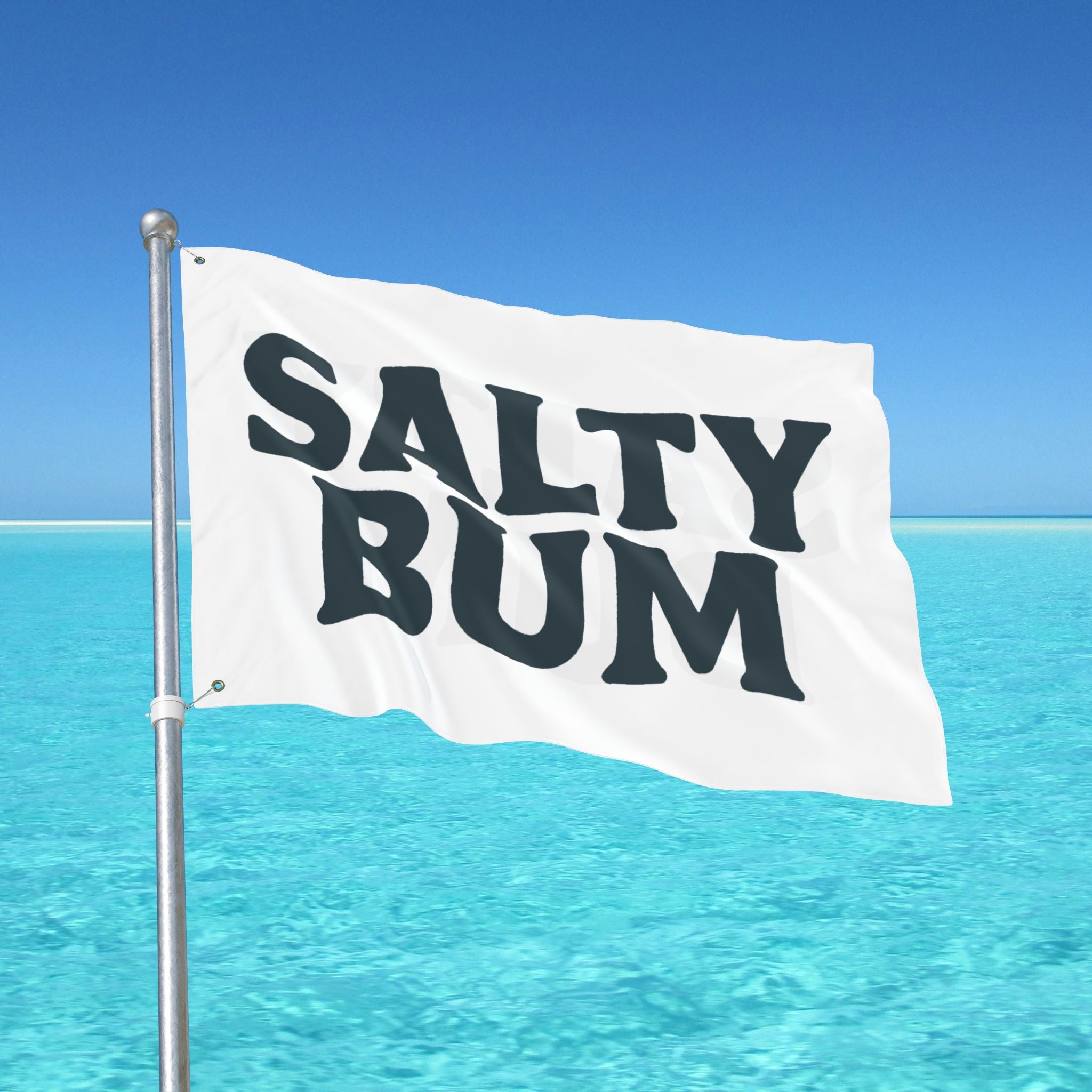 Flag with 'Salty Bum' text against a clear blue sky and ocean background