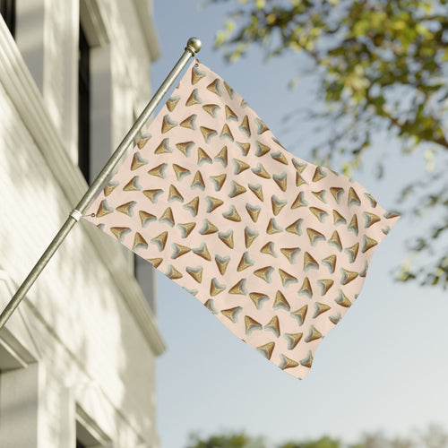 Decorative metal flag with geometric pattern on a building