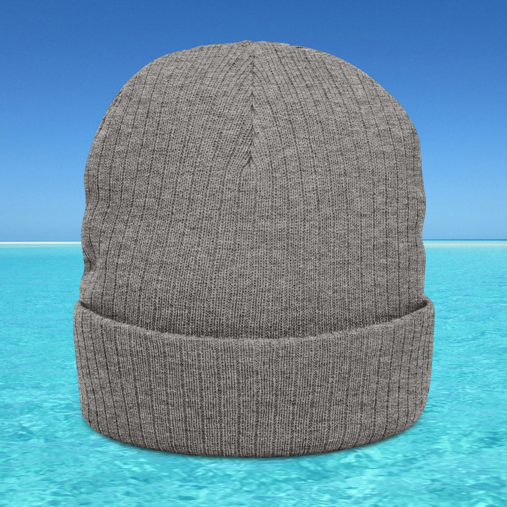 Gray knit beanie on a blue water background