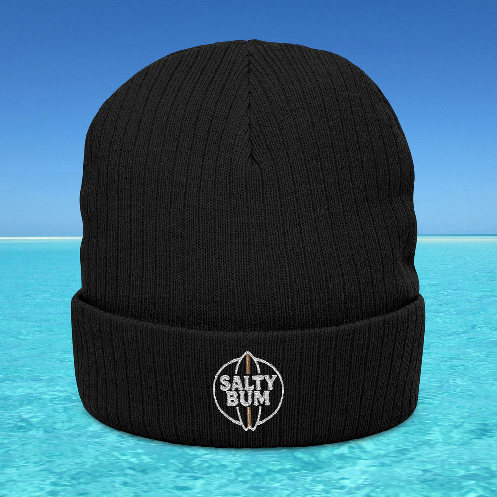 Black beanie with 'Salty Bum' logo on a blue water background