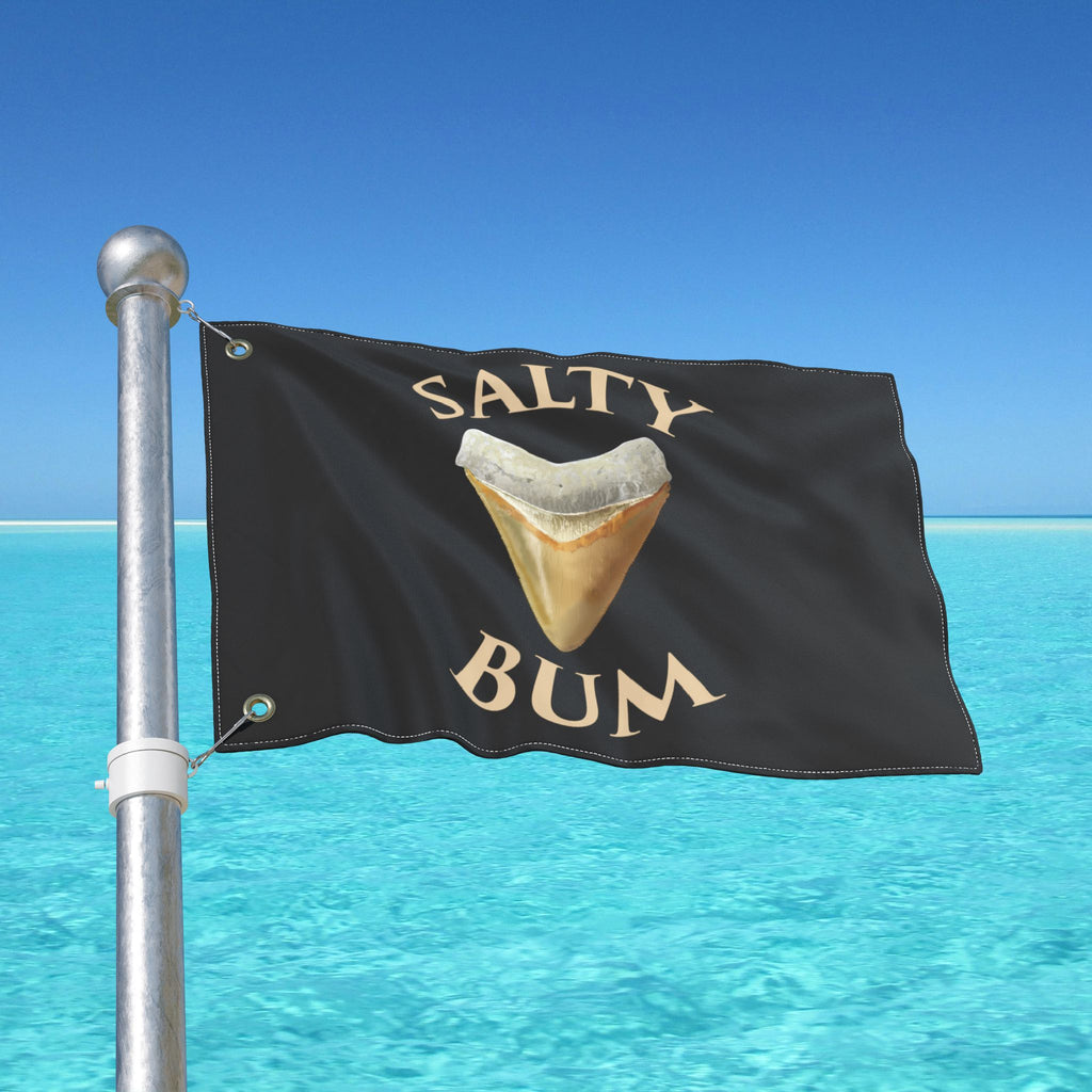 Flag with 'Salty Bum' text and a shark tooth graphic against a blue ocean background