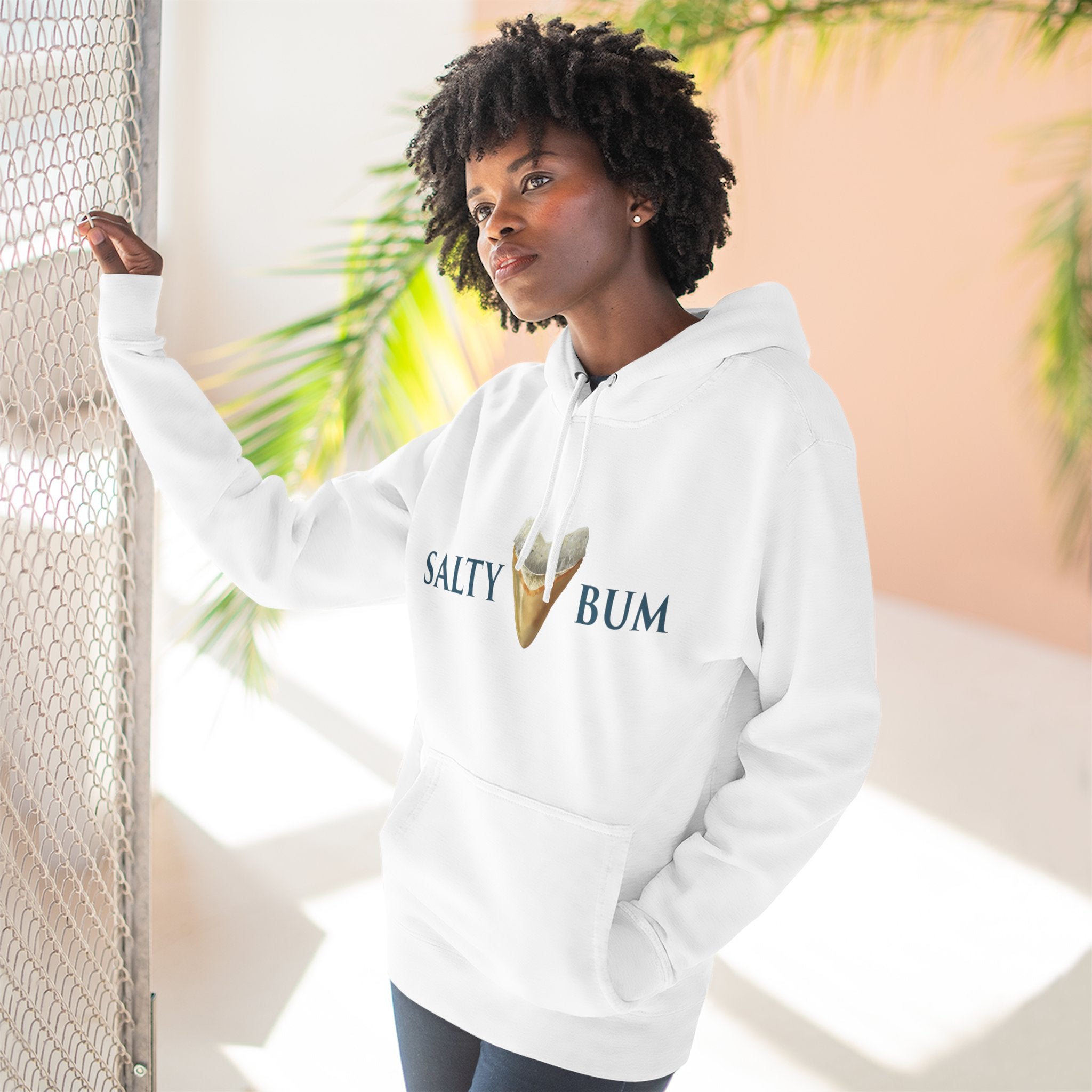 Person wearing a white hoodie with 'Salty Bum' text and ice cream graphic.